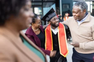 graduate of college and his parents