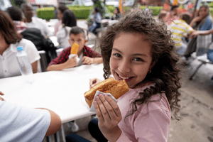 girl eating a sandwich