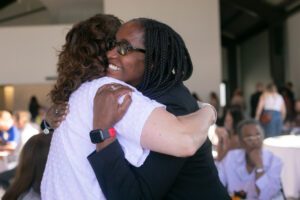two women hugging