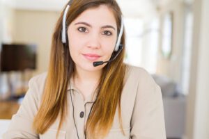 woman operator wearing headset at the office